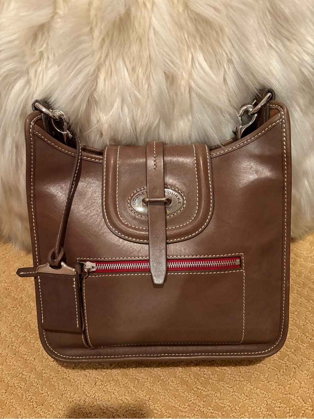 Dooney & Bourke Brown Leather Shoulder Bag with Red Zip Accent